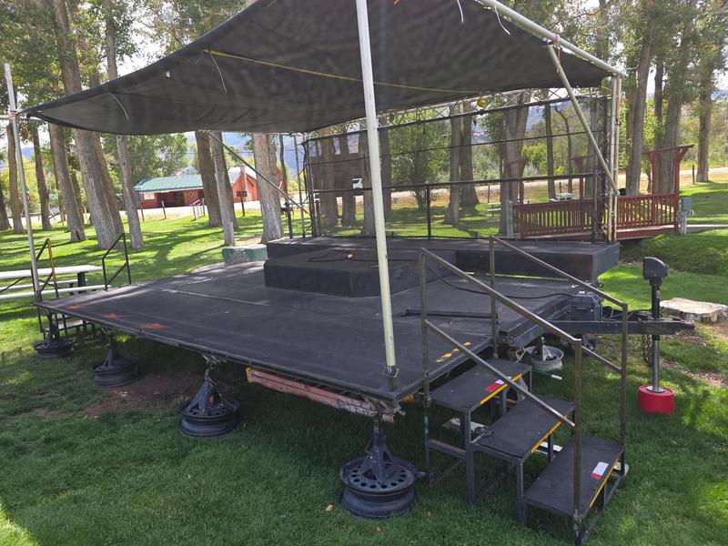Charlee's Bar outdoor stage rental — 16x16 foot stage with canopy